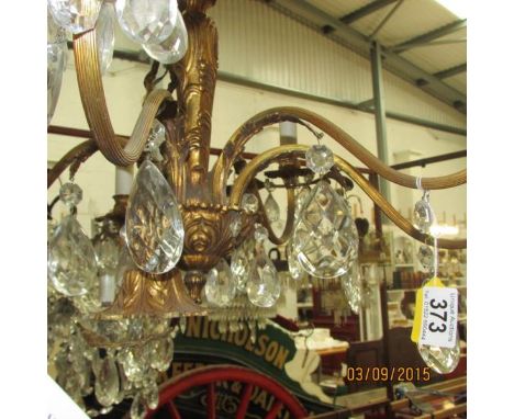 A 6 lamp brass ceiling light