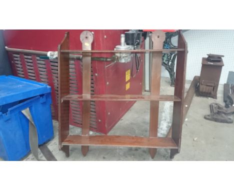 An antique wall shelf