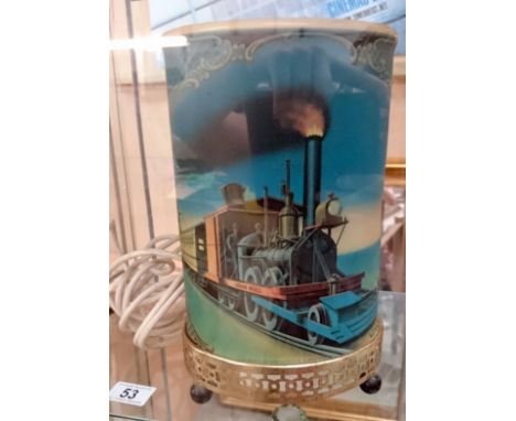 An electric lamp with 'railway' shade