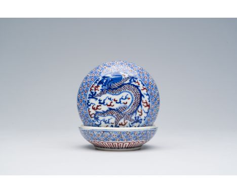 Full title: A Chinese blue, white and copper-red 'dragons' seal paste box, 19th C.Description:Dia.: 9 cmCondition reports and