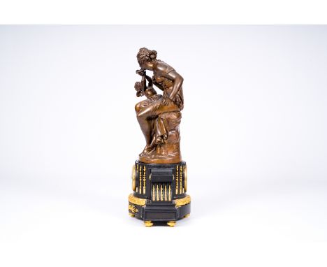 Full title: A French gilt bronze mounted ebonized wood mantle clock crowned with Galatea and Cupid, 19th/20th C.Description:H