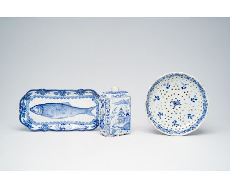 Full title: A Dutch Delft blue and white strainer, a 'chinoiserie' tea caddy and a 'herring' dish, 18th C. and laterDescripti
