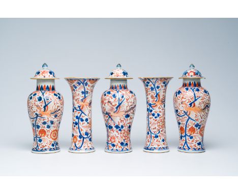 Full title: A Chinese Imari style five-piece garniture with a phoenix among blossoming branches, KangxiDescription:H 27,5 - 2