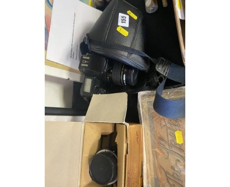 A Canon camera and  Sigma lens