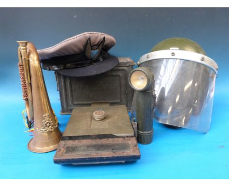 A .30 cal ammunition box, M6 periscope torch, helmet, bugle etc