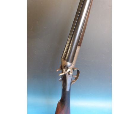 A George Gibbs 12 gauge side-by-side hammer action shotgun 28 inch barrels, serial number B7691.  PLEASE NOTE THAT A VALID RE