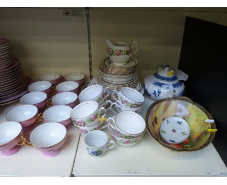 A pink ground part tea set with pedestal cups, beehive mark to base (possibly Vienna) and a quantity of decorative teaware, b