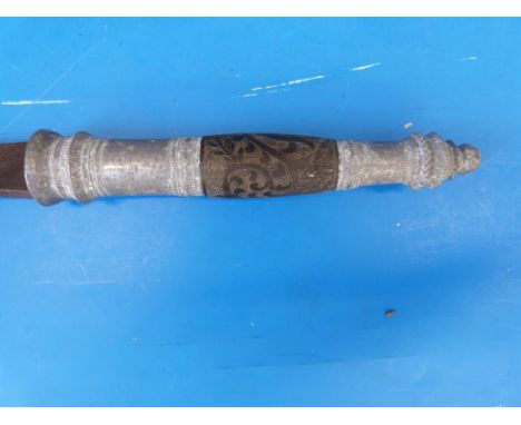 An 18thC / 19thC Persian sword in scabbard with engraved design to hilt