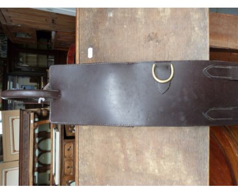 A Shires brown leather anti cast roller, new