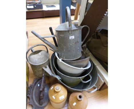 A collection of vintage galvanized garden items, scales