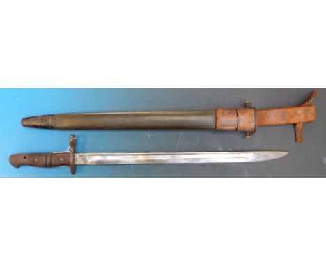 A 1917 Remington bayonet with leather scabbard