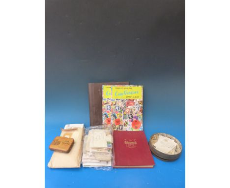 A box of stamp albums, loose stamps, covers and sundries