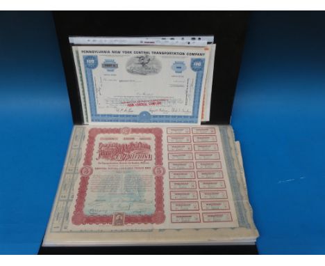 A collection of various share certificates to include mining, railroads, chemist etc.