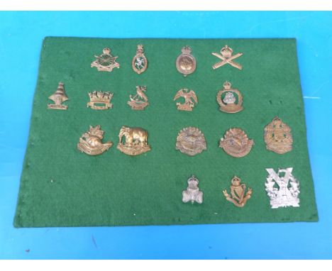 Seventeen various British Army cap badges including WW1 Army Cyclists, Australasian, British Africa, British American, Britis