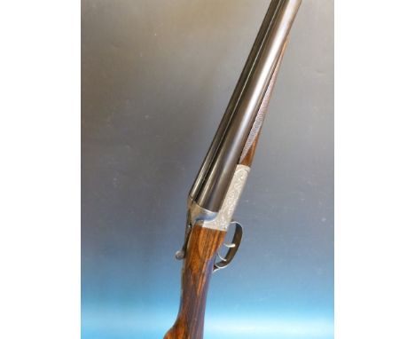 An F Beesley 12 bore double barrelled side by side box lock ejector shotgun with all over engraved decoration with F Beesley 