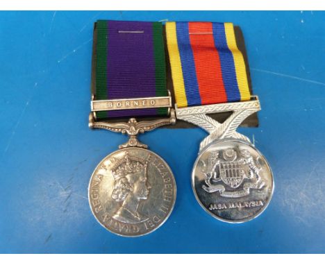 A campaign Service Medal (Borneo) and Pinot Jasa Malaysia medal to K.941536 R A G Newman M (E) 1 Royal Navy  