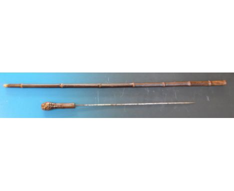 A bamboo sword stick or cane with square tapering blade