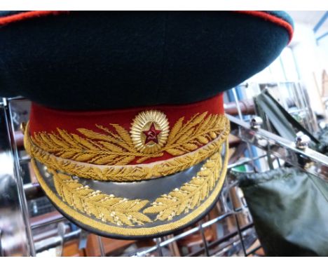 A tank commander's helmet with intercom by Racal in bag, together with a Russian military uniform