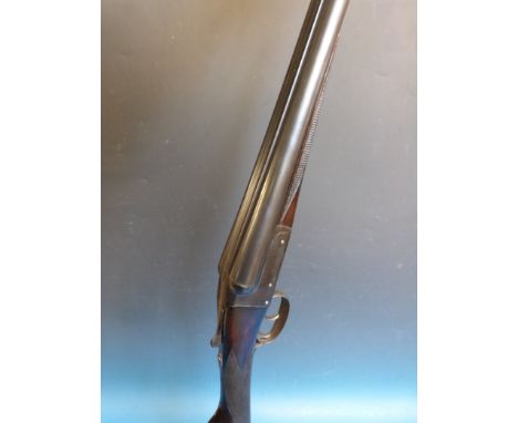 A Bradell 12 gauge side by side double barrelled shotgun, 28 inch barrels, serial number 7230, in original leather bound carr