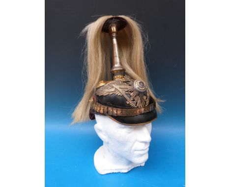 A WWI German officer's pickelhaube with enamel central medallion and Suum Cuique motto, the spike topped with horse hair (31c