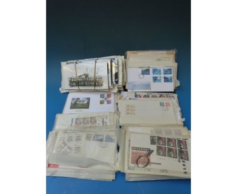 A large quantity of GB First Day Covers and mint stamps