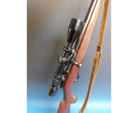 A Walker bolt action selective fire .22 rifle 34881 with Nikko Stirling 3 - 9 x 40 scope.  PLEASE NOTE THAT A VALID RELEVANT 