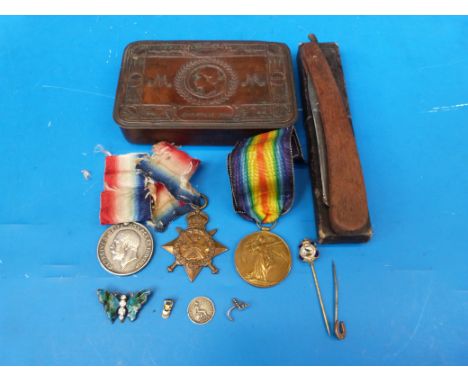 A group of three WWI medals including a 1914 Star awarded to 42774 Gnr F Sheppard, RFA, a 1914 Christmas tin, razor etc, a 18