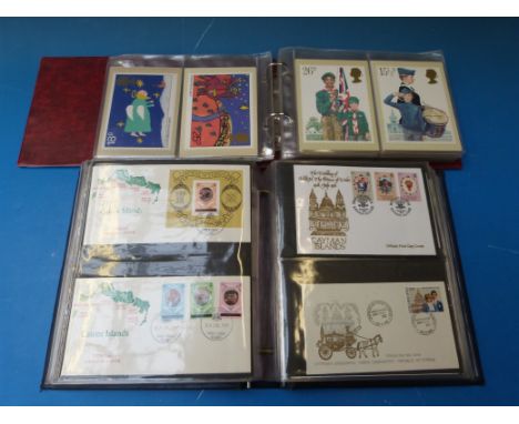 An album of PHQ cards and an album of Colonial first day covers