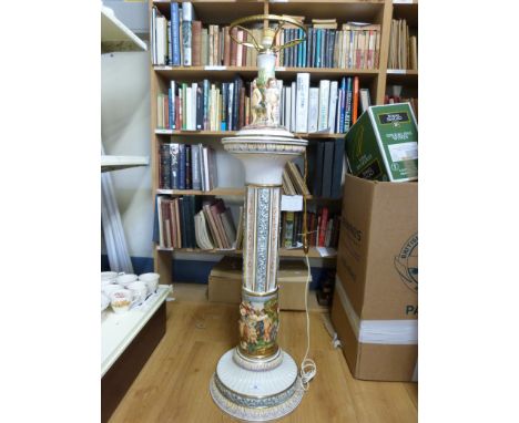 A continental style ceramic floor-standing lamp with figural decoration