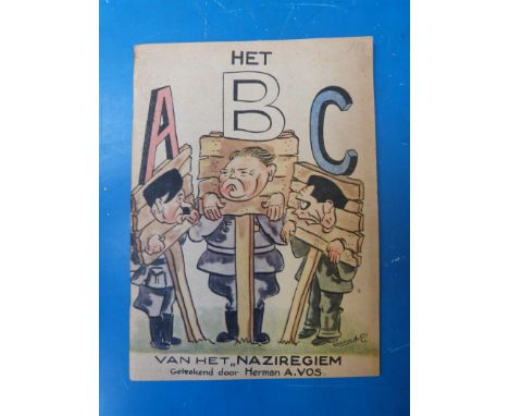 A Dutch children's book Het Naziregiem ABC, soft back, light tanning to the cover, staples not rusted and colours still brigh