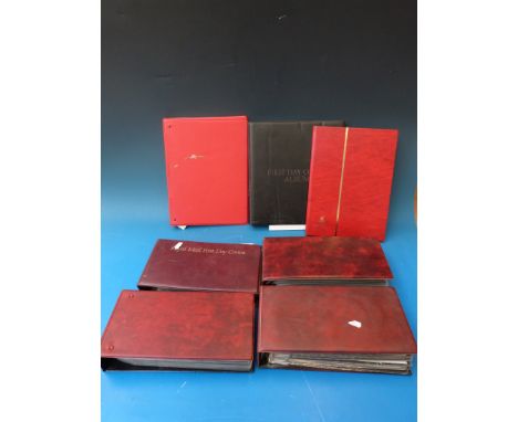 A quantity of first day covers in seven albums