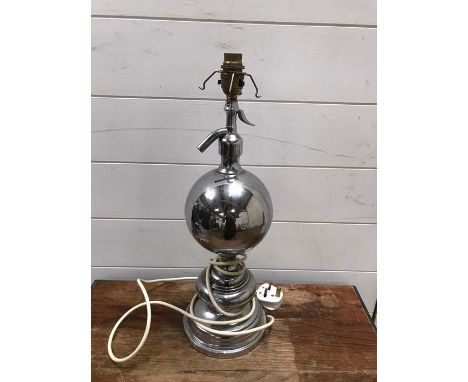 A white metal table lamp base