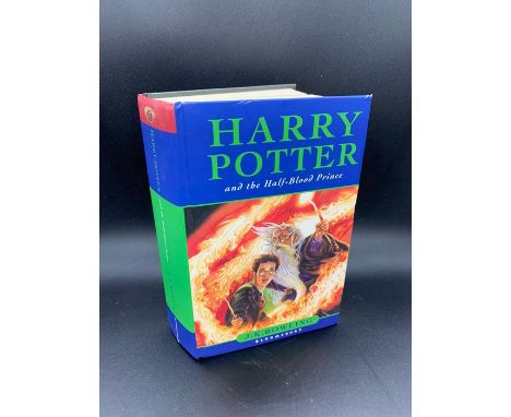 A First Edition Hard Back Harry Potter and the Half Blood Prince by J K Rowling with the misprint on Page 99