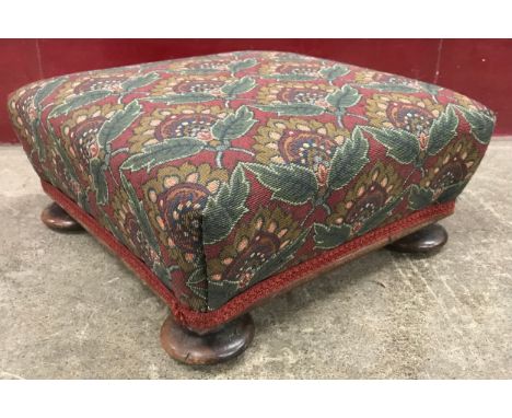 A Victorian walnut and floral fabric upholstered footstool 