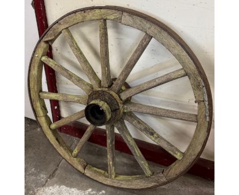 A vintage wooden cartwheel 
