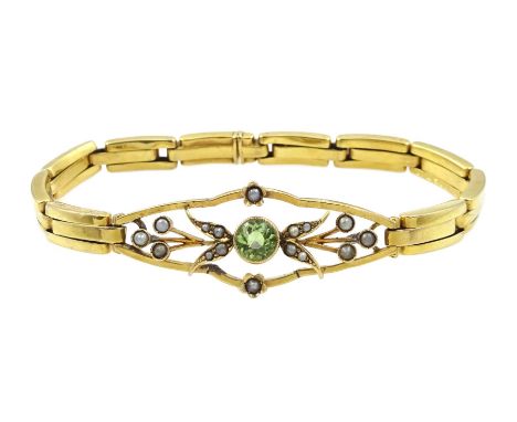 Early 20th century gold peridot and split seed pearl bracelet, on expanding strap, stamped 9ct - Condition Report Approx 9.5g