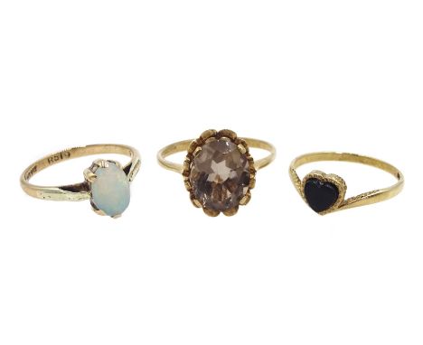 Gold single opal ring, gold jet heart shaped ring and a gold smoky quartz ring, all hallmarked 9ct - Condition Report Approx 