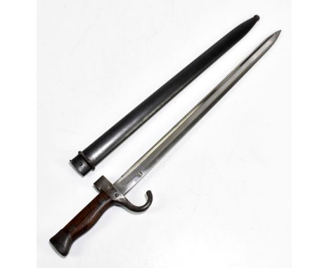 A French Model 1892 bayonet, the fullered blade stamped 'JC' to base, the quillon no.92983, with scabbard bearing matching se