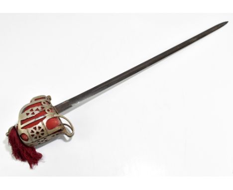 HENRY WILKINSON LONDON; a Scottish Highland Infantry Officer's sword with etched detail to the fullered blade, with plated ba