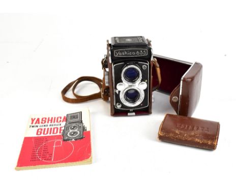 YASHICA; a 635 Copal-MXV twin lens camera S/N ST 2120326, the upper lens Yashikor 1:3,5 f=80mm 943340, in YashicaFlex case wi