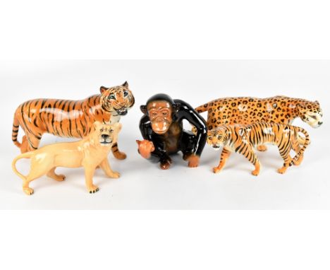 BESWICK; four assorted animal figures&nbsp;including stalking tiger, lioness, etc, also a Sylvac model of a chimpanzee (5).Ad