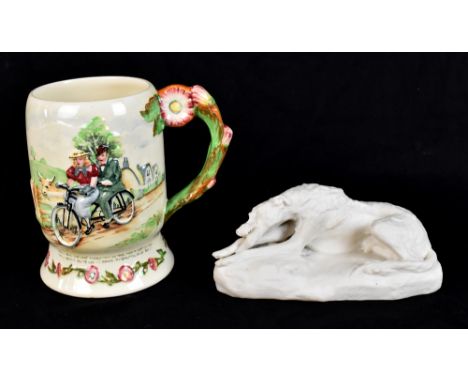 COPELAND; a 19th century Parian ware figure of a dog,&nbsp;length 18cm, and a Crown Devon Fieldings musical mug 'Daisy Bell' 