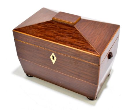 A 19th century partridge wood tea caddy, the hinged cover enclosing two compartments, with ivory escutcheon,&nbsp;length 19cm