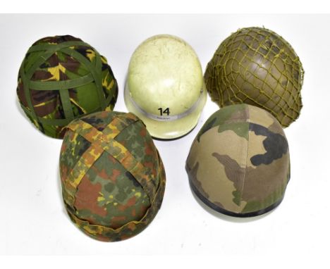 Five military and public service helmets comprising mid/late 20th century US helmet with webbing, French Army 78-FI (second v