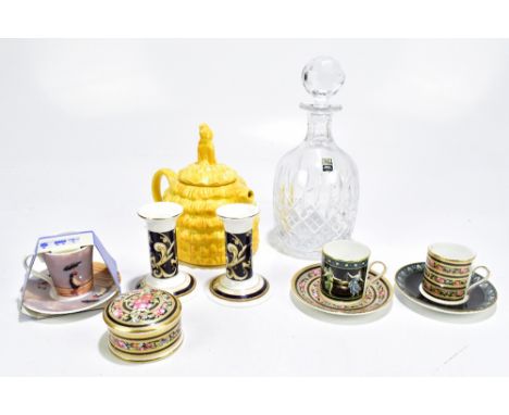A collection of ceramics to include Wedgwood coffee cans and saucers, a pair of similar candlesticks, glass decanter, etc.Add