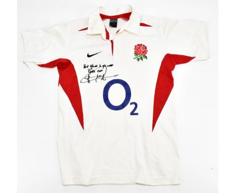 JOHNNY WILKINSON; a signed England Rugby Nike shirt with O2 logo and further inscription 'Best of luck to you mate take care'