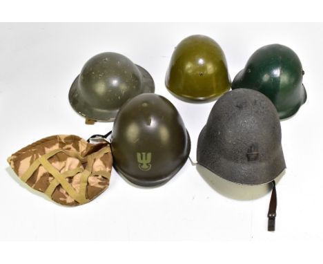 Five military helmets comprising a mid/late 20th century US helmet, Bulgarian Army M36C, a British Mk II Brodie-type, Polish 