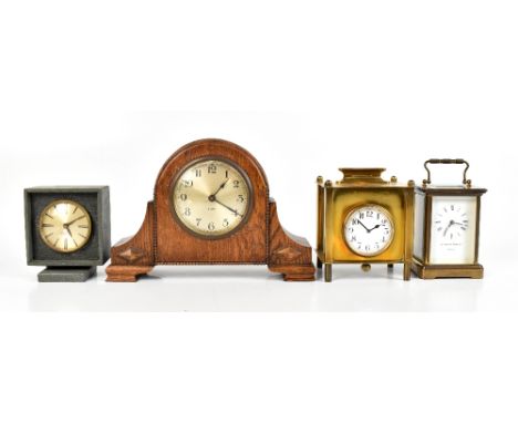MATTHEW NORMAN; a modern brass cased carriage clock, the enamelled dial with Roman numerals,&nbsp;height&nbsp;including swing