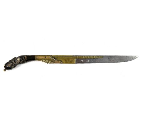 A good quality 19th century knife/dagger, possibly a Sri Lankan piha kaetta, the steel and brass blade with chased foliate de