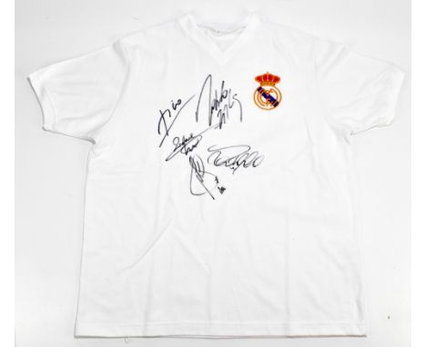 REAL MADRID LEGENDS; a retro-style cotton home shirt with embroidered crest, signed to front by Figo, Roberto Carlos, Zidane,